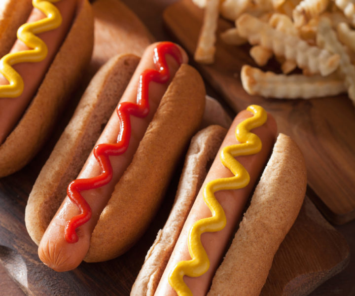 grilled hot dogs with mustard ketchup and french fries
